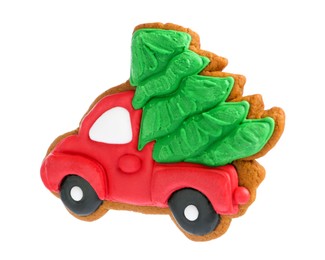 Photo of Christmas cookie in shape of car with fir tree isolated on white