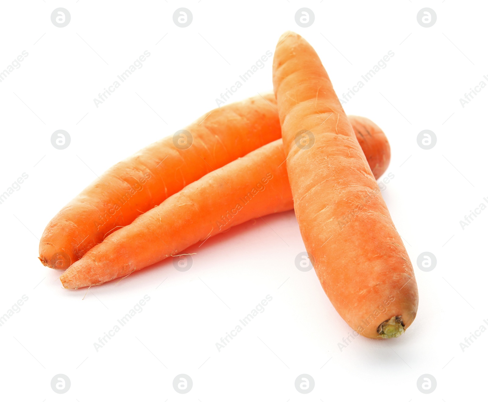 Photo of Ripe fresh carrots on white background