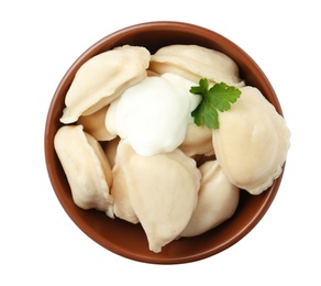 Tasty dumplings with sour cream and parsley in bowl isolated on white, top view