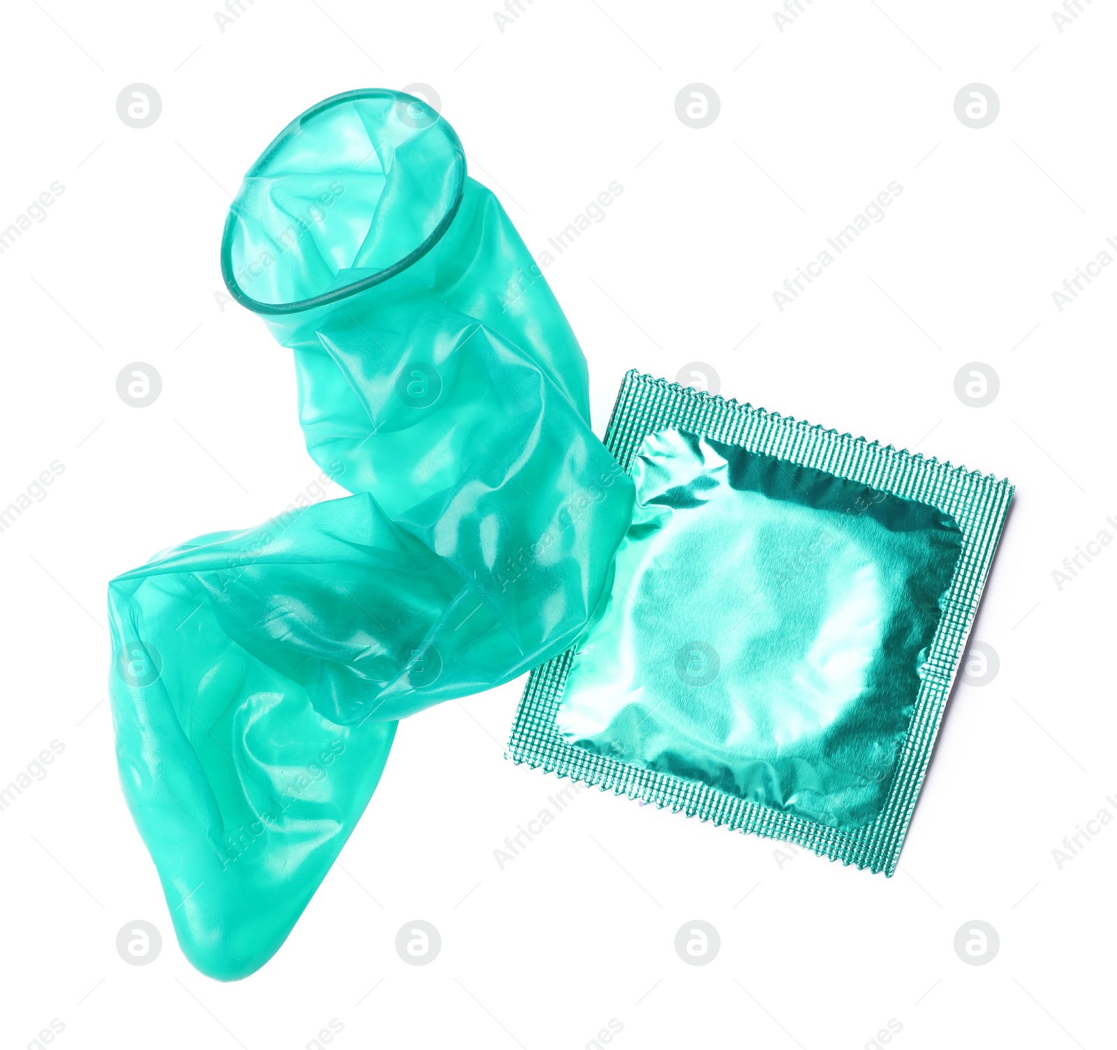 Image of Unrolled turquoise condom and package on white background, top view. Safe sex