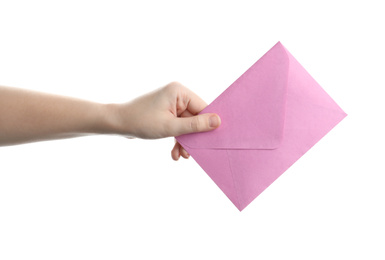 Woman holding pink paper envelope on white background, closeup