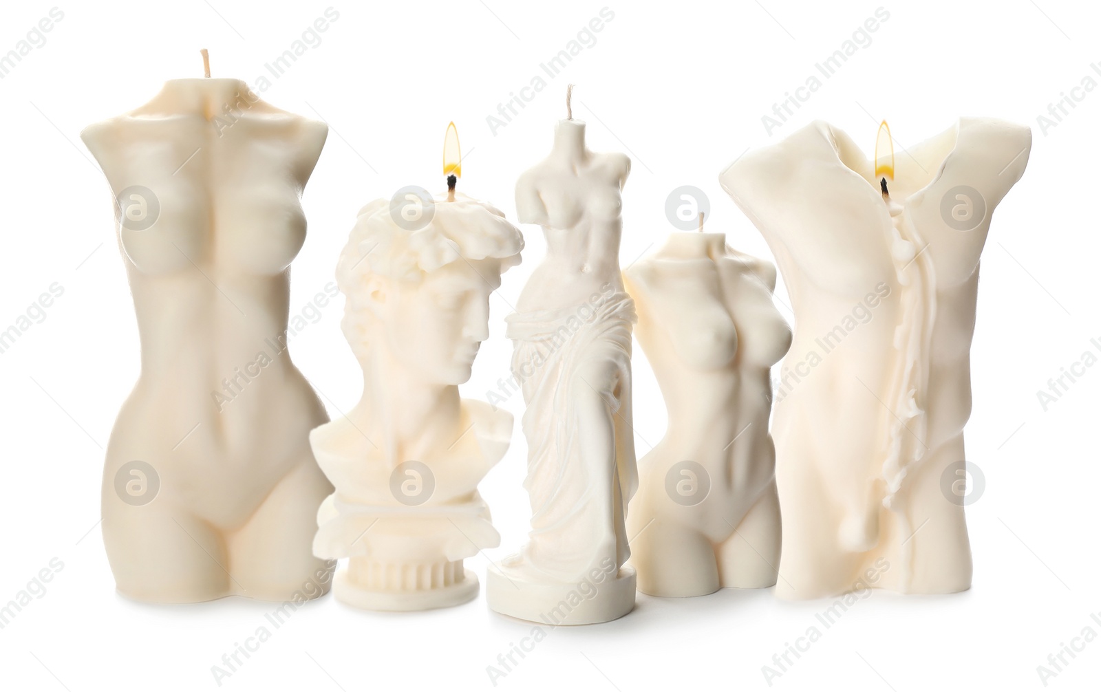 Image of Collection of beautiful sculptural candles on white background