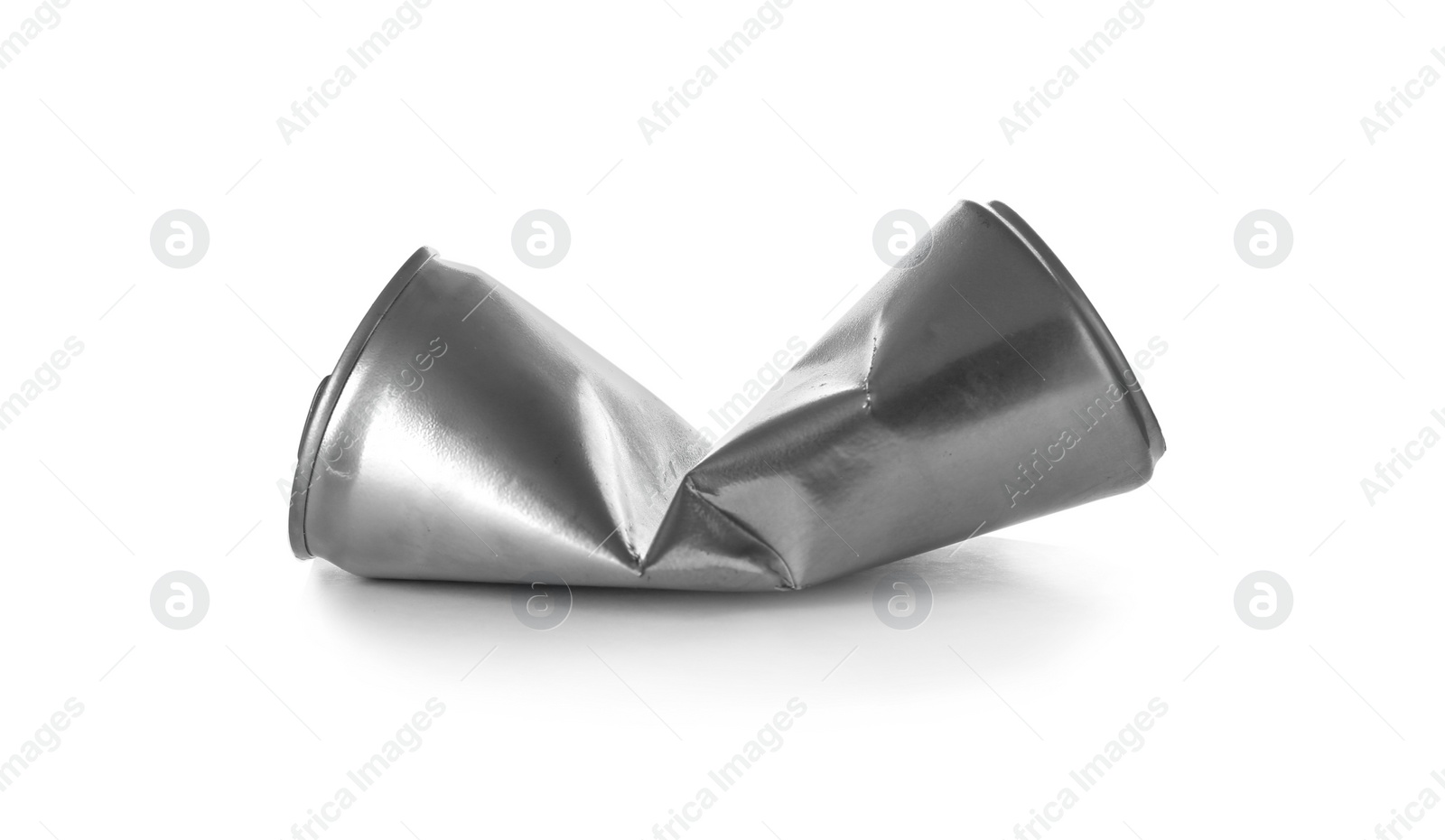 Photo of Empty crumpled aluminum can on white background. Metal waste recycling