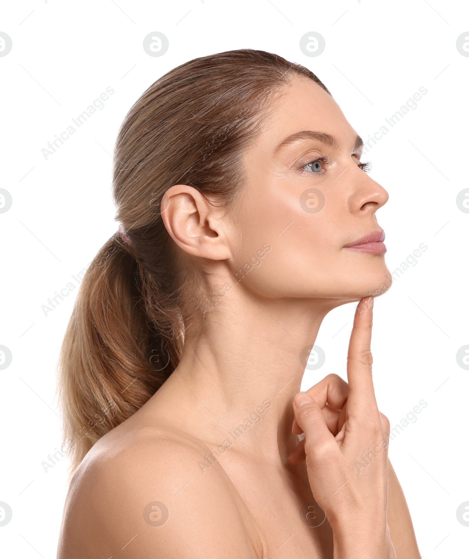 Photo of Woman massaging her face on white background