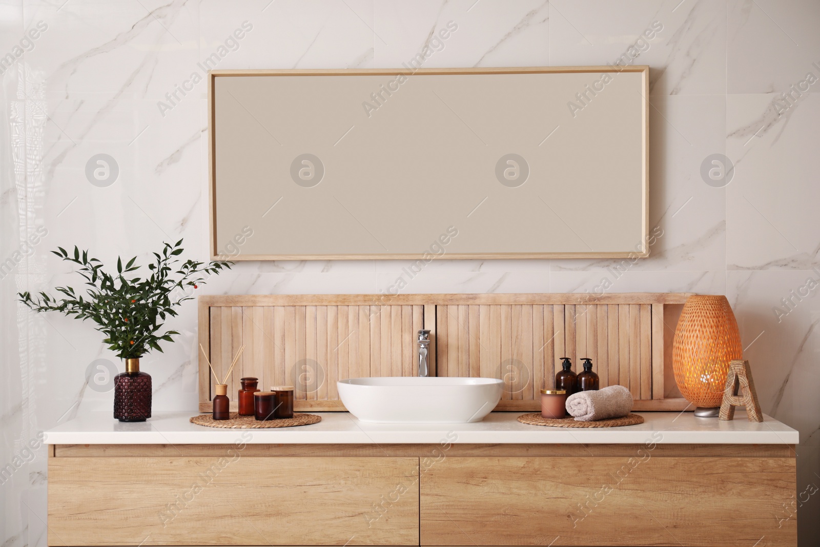 Photo of Modern bathroom interior with stylish mirror and vessel sink