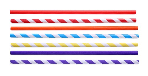 Photo of Many different paper cocktail straws on white background