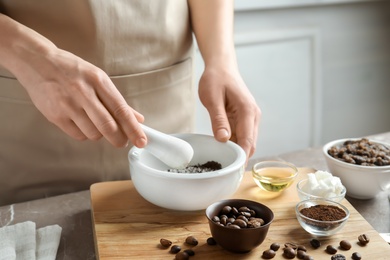 Photo of Woman preparing natural body scrub