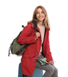 Woman with map and suitcase on white background. Winter travel