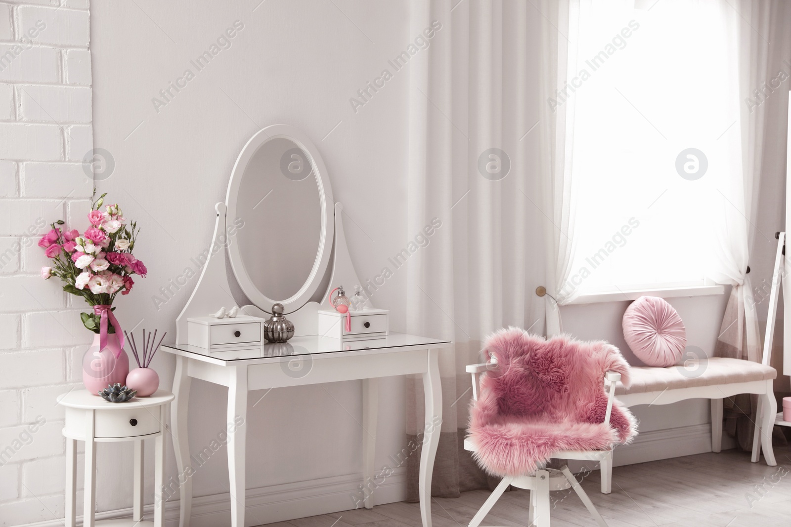 Photo of Stylish room interior with white dressing table