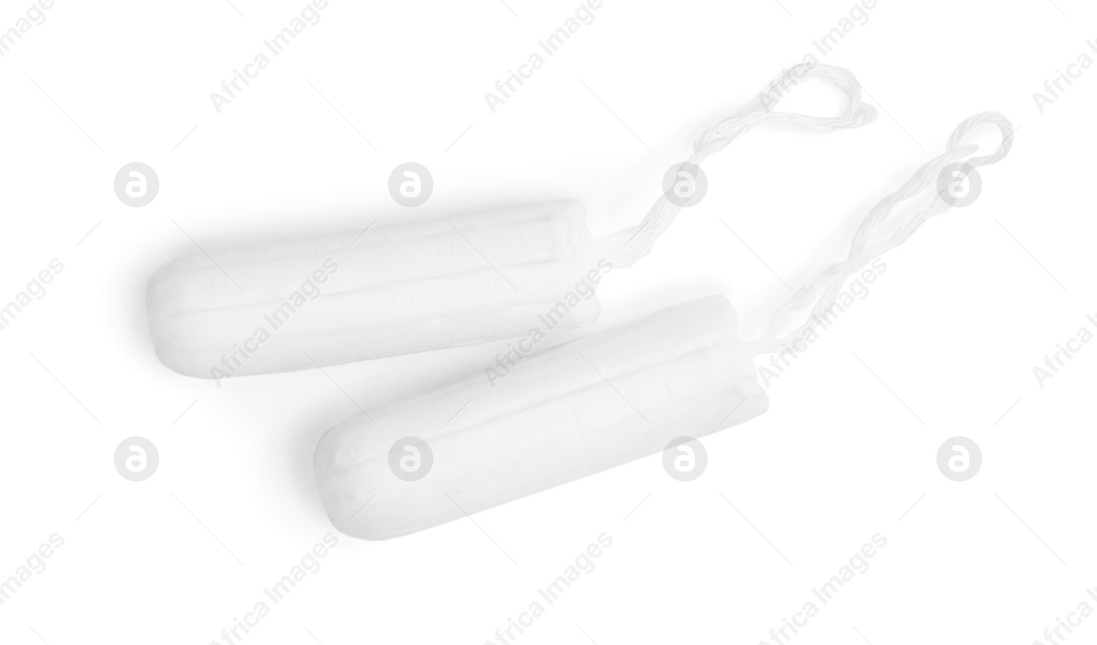 Photo of Tampons on white background, top view. Menstrual hygiene product