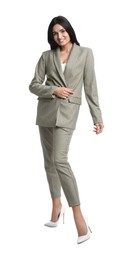 Photo of Full length portrait of beautiful woman in formal suit on white background. Business attire