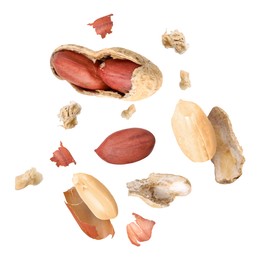 Image of Peanuts and crushed pod in air on white background