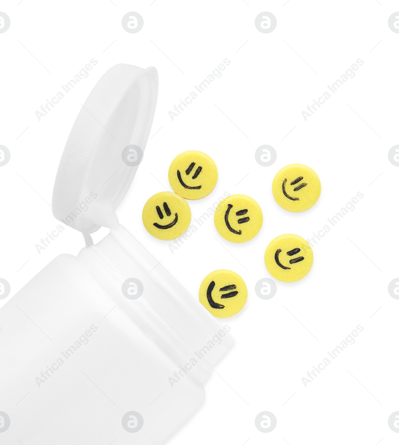 Photo of Bottle and yellow antidepressant pills with happy faces isolated on white, top view