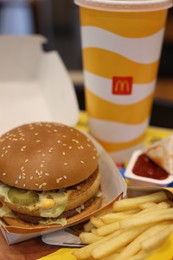 Photo of Lviv, Ukraine - October 9, 2023: McDonald's menu on table in restaurant, closeup