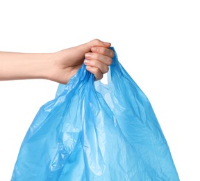Photo of Woman holding light blue plastic bag on white background, closeup