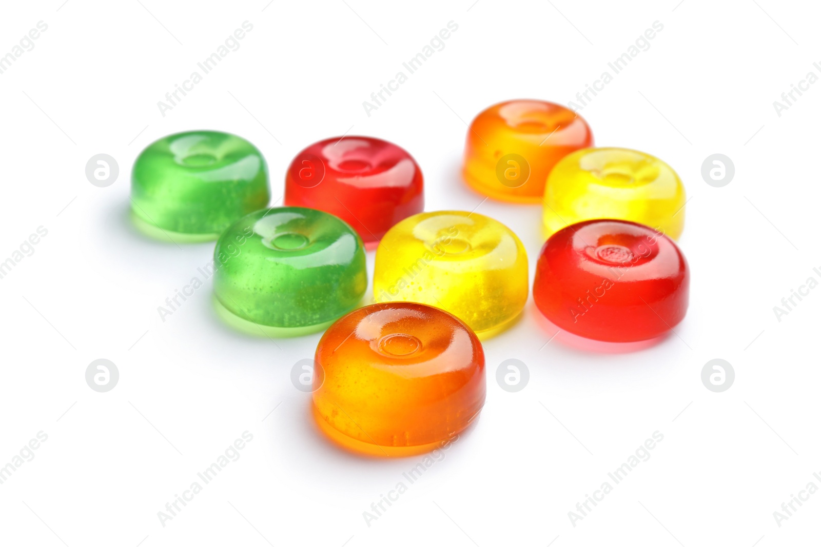 Photo of Different delicious colorful candies on white background