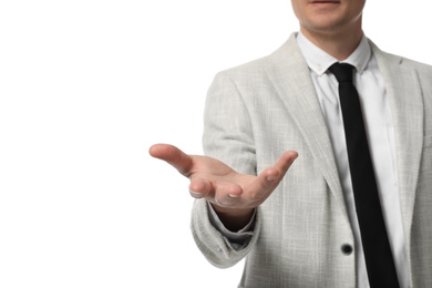 Photo of Businessman holding something on white background, closeup