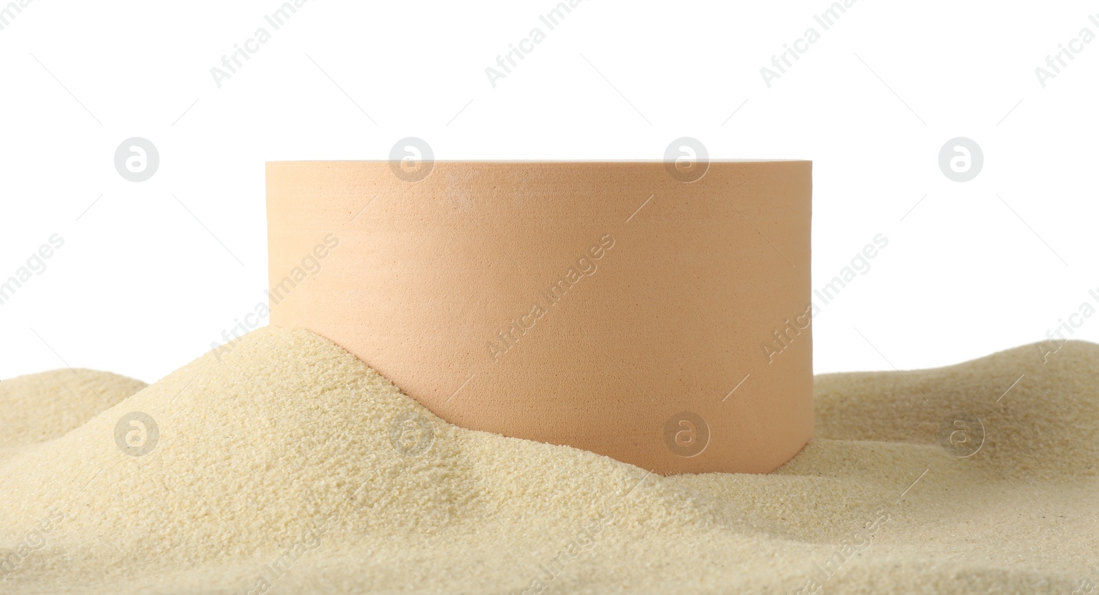 Photo of Presentation of product. Beige podium on sand against white background