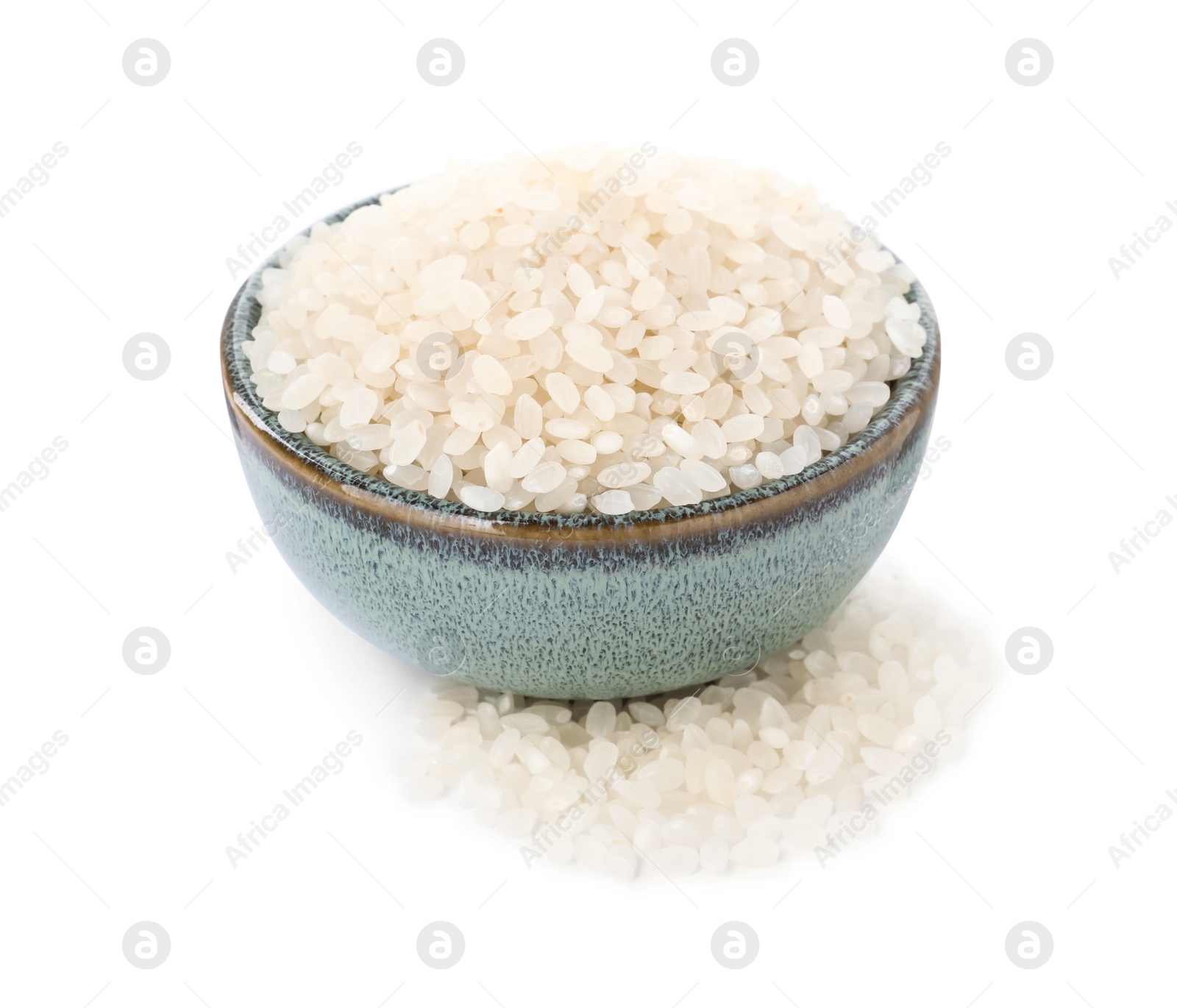 Photo of Bowl with raw rice isolated on white