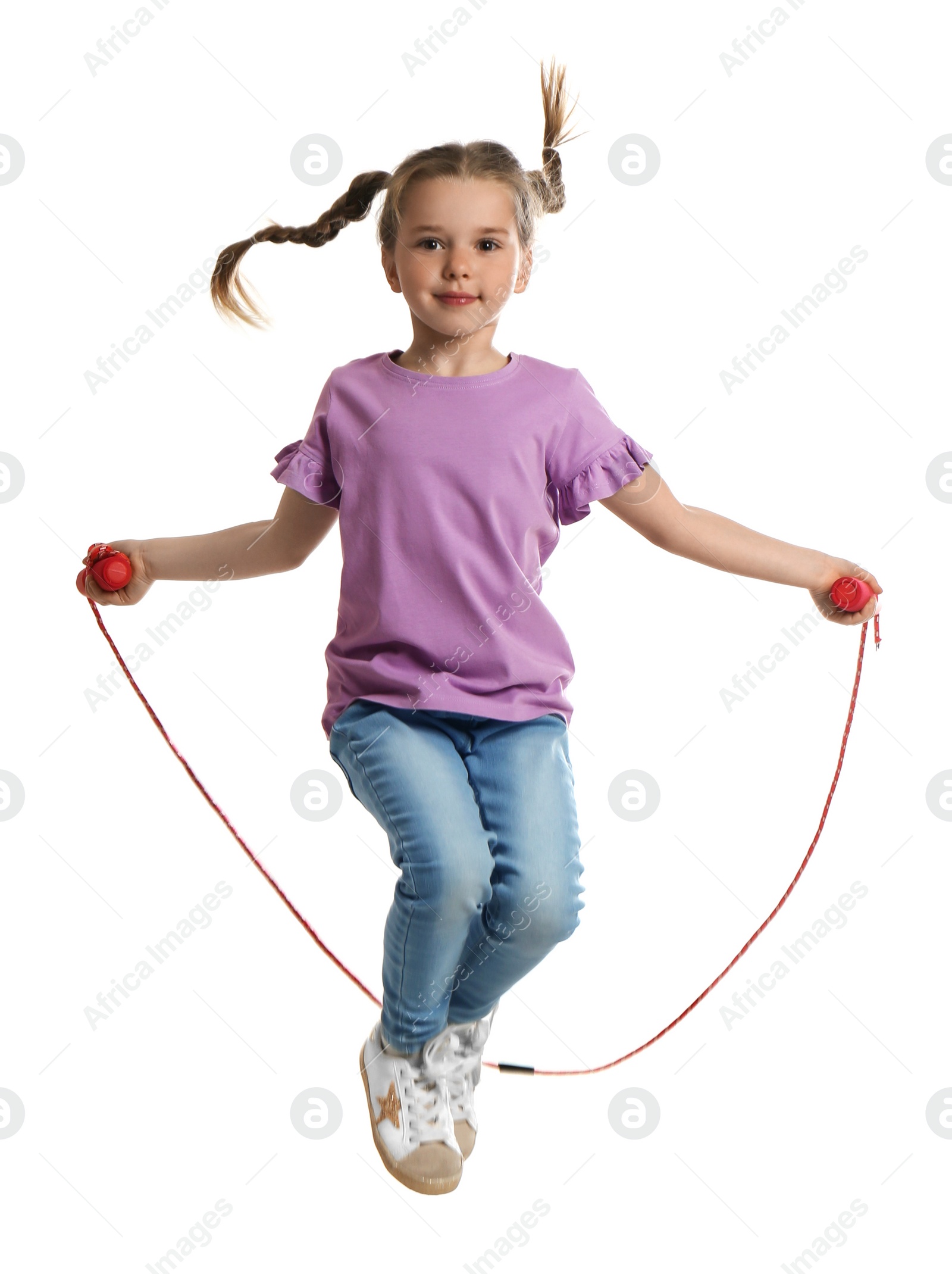 Photo of Cute little girl with jump rope on white background