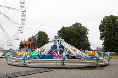 Photo of DARLOWO, POLAND - AUGUST 22, 2022: Kids attractions in amusement park
