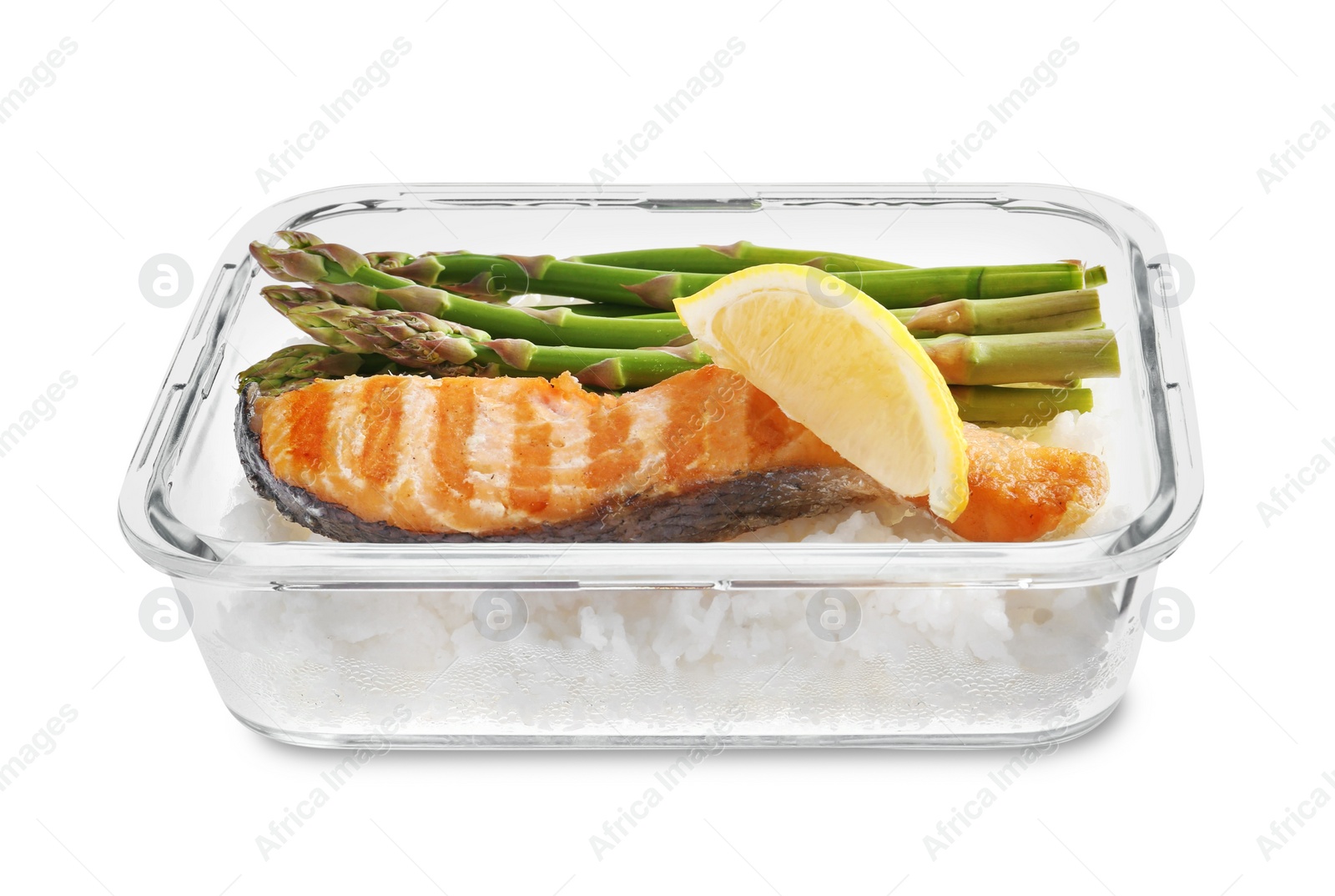 Photo of Healthy meal. Grilled salmon, rice and asparagus in container isolated on white