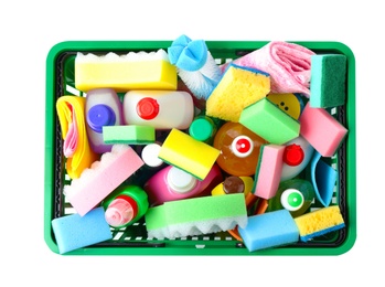 Shopping basket with different detergents on white background, top view