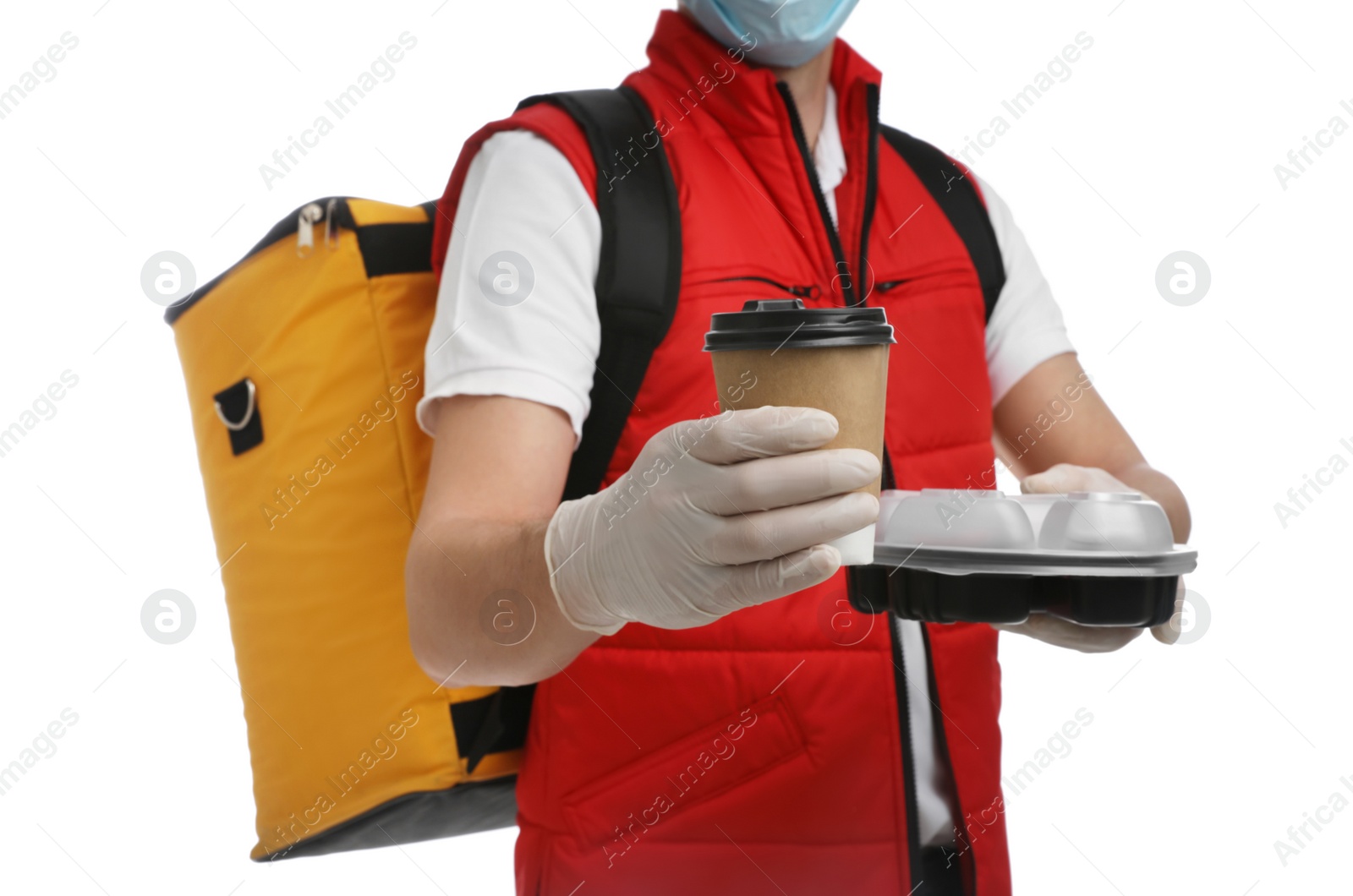 Photo of Courier in protective gloves with drink and food order on white background, closeup. Food delivery service during coronavirus quarantine