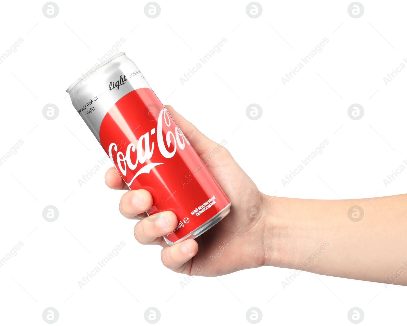 Photo of MYKOLAIV, UKRAINE - NOVEMBER 15, 2018: Man holding Coca Cola can on white background, closeup