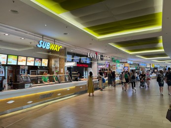 Photo of WARSAW, POLAND - JULY 13, 2022: Fast food restaurants in shopping mall