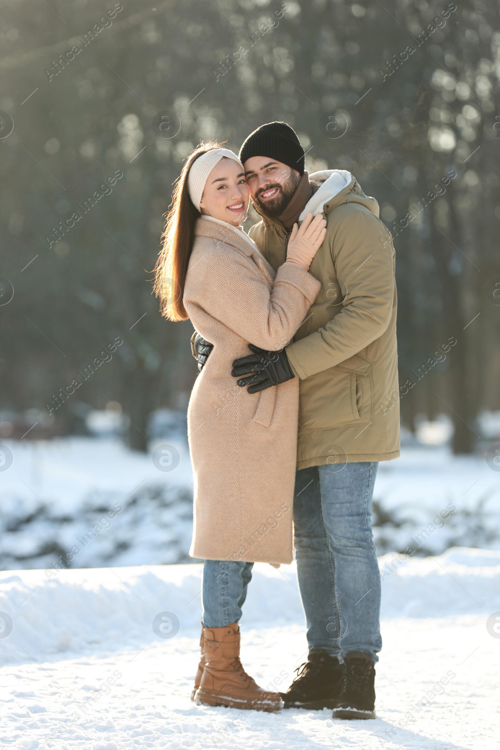 Photo of Beautiful young couple enjoying winter day outdoors