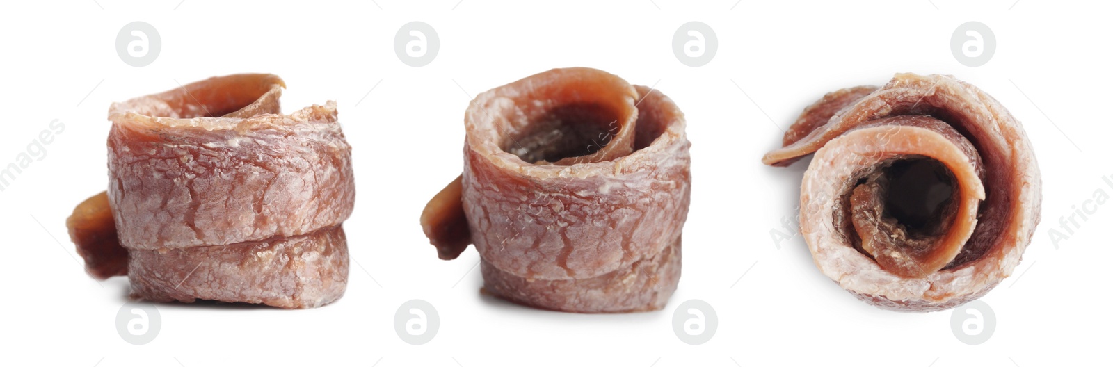 Image of Set with delicious rolled anchovy fillets on white background. Banner design