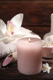 Composition with spa supplies and flowers on wooden table