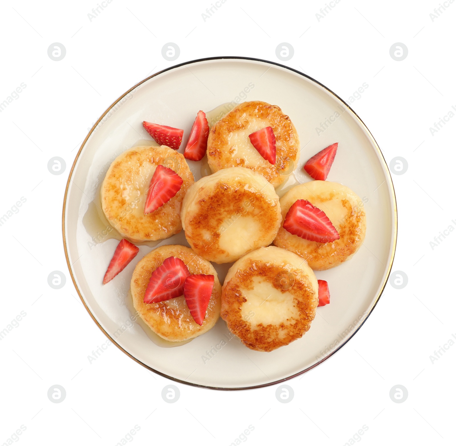 Photo of Delicious cottage cheese pancakes with strawberries and honey on white background, top view