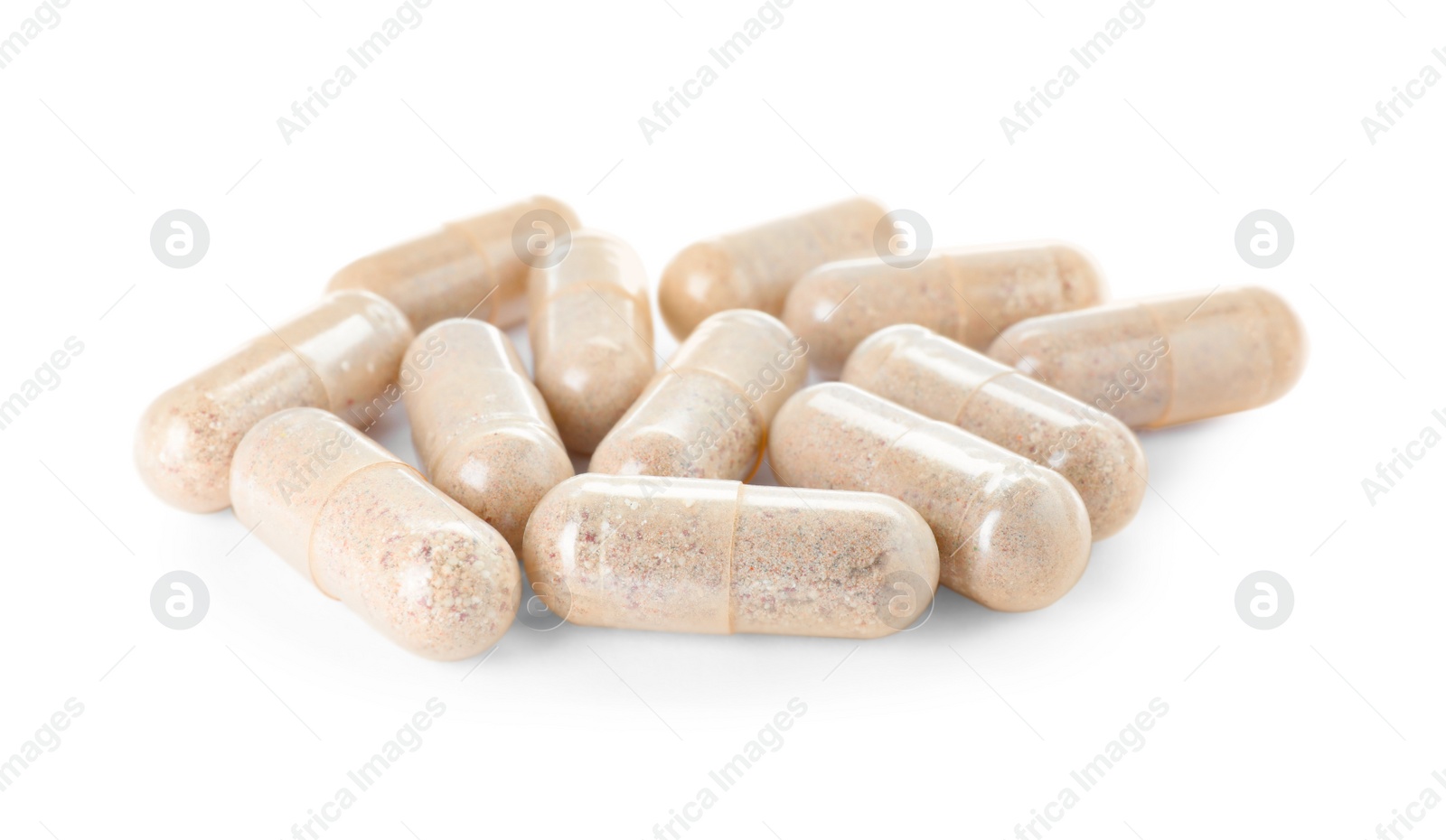 Photo of Many transparent gelatin capsules on white background