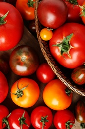 Flat lay composition with fresh ripe tomatoes on table