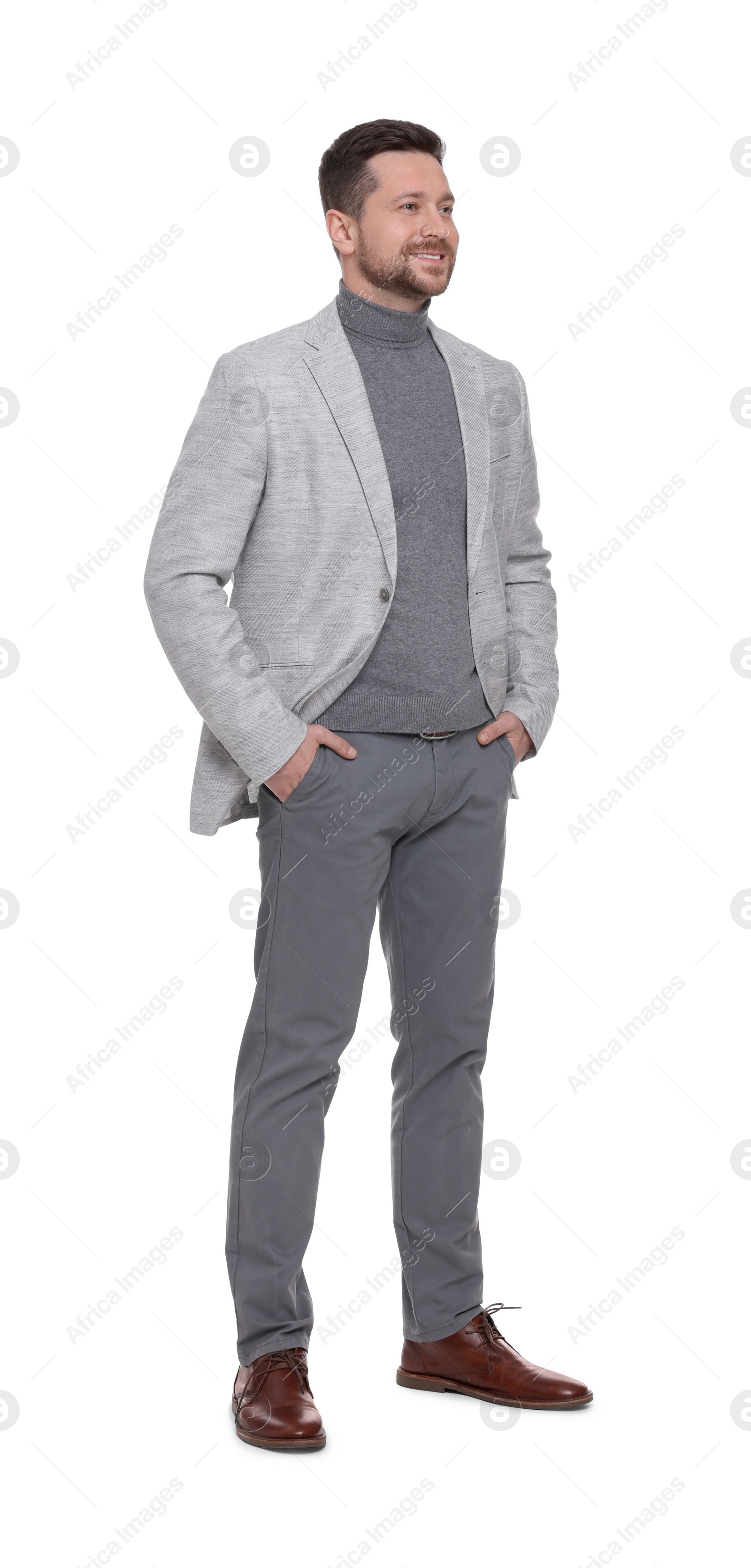 Photo of Handsome bearded businessman in suit on white background