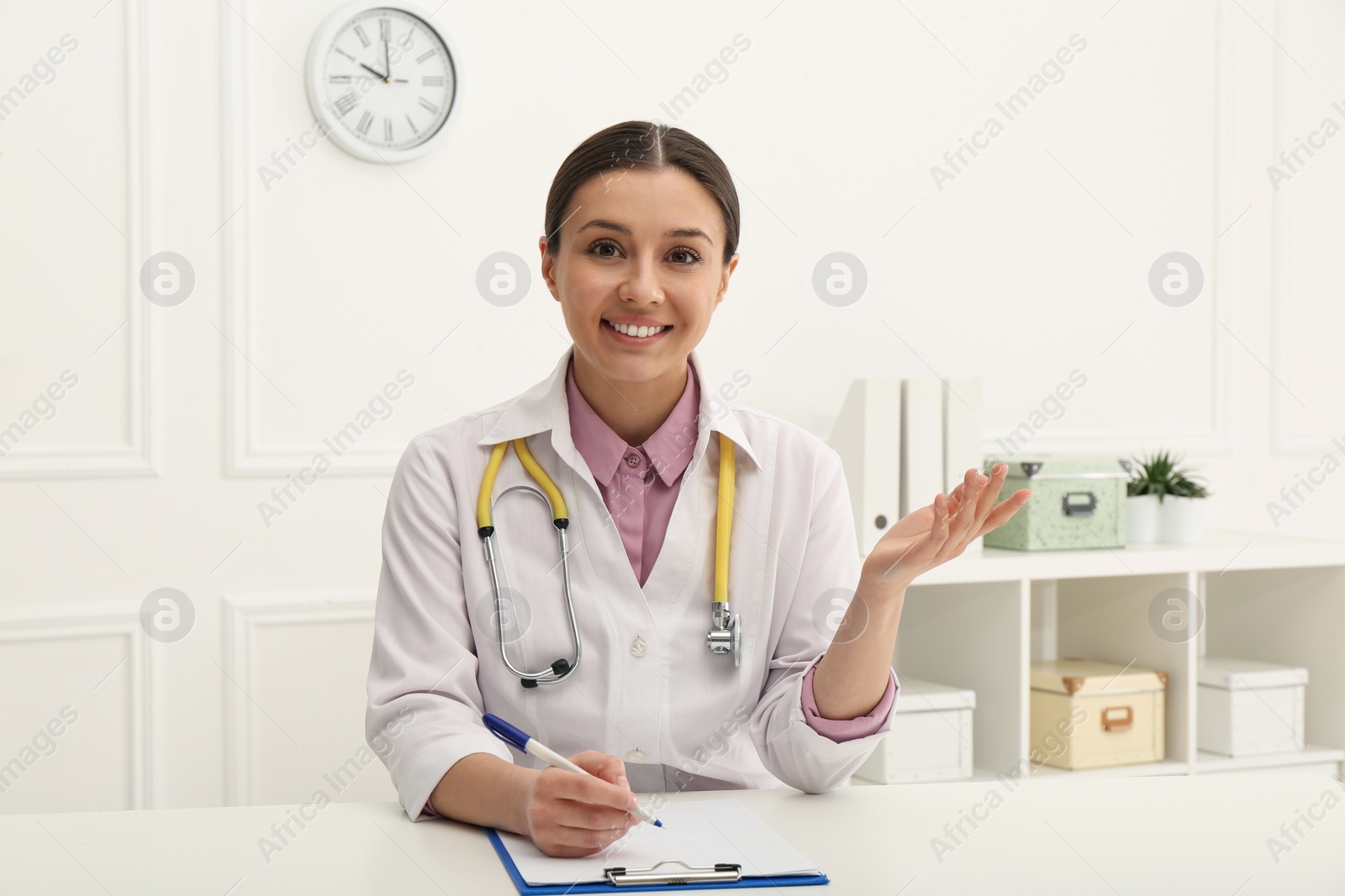 Photo of Pediatrician consulting patient using video chat in clinic, view from webcam