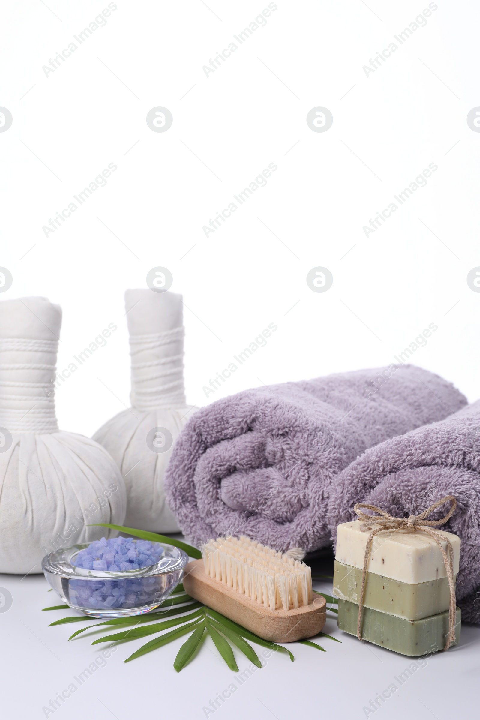 Photo of Different spa supplies and floral decor isolated on white