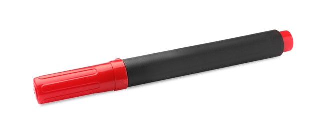 Photo of Bright red marker isolated on white. School stationery