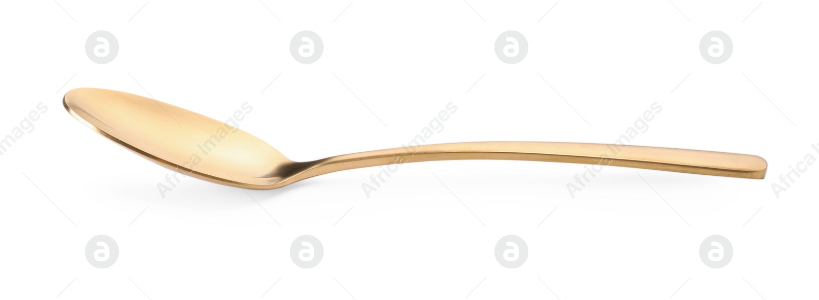 Photo of One shiny golden spoon isolated on white