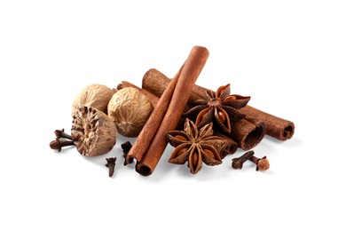 Heap of different spices on white background