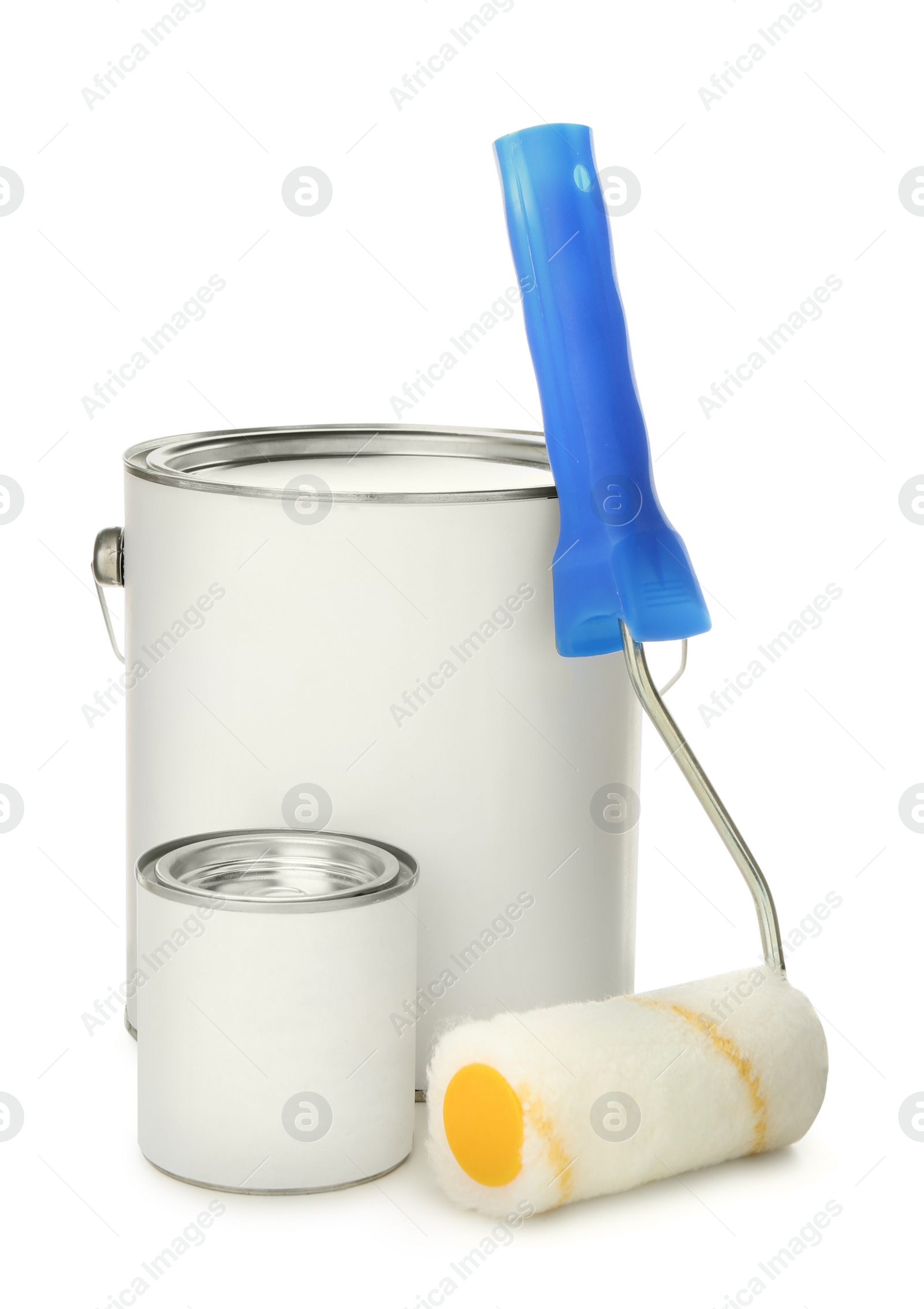 Photo of Paint cans and roller on white background