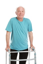 Portrait of elderly man using walking frame isolated on white