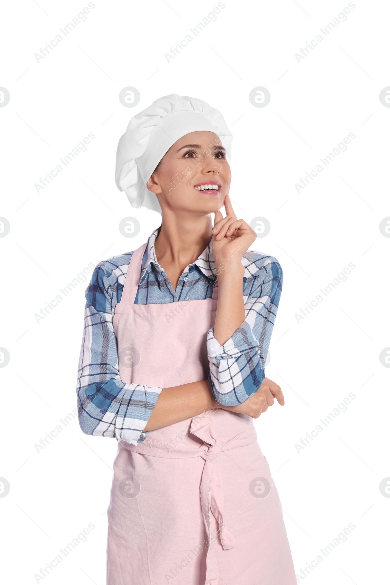 Photo of Dreaming female chef in apron on white background
