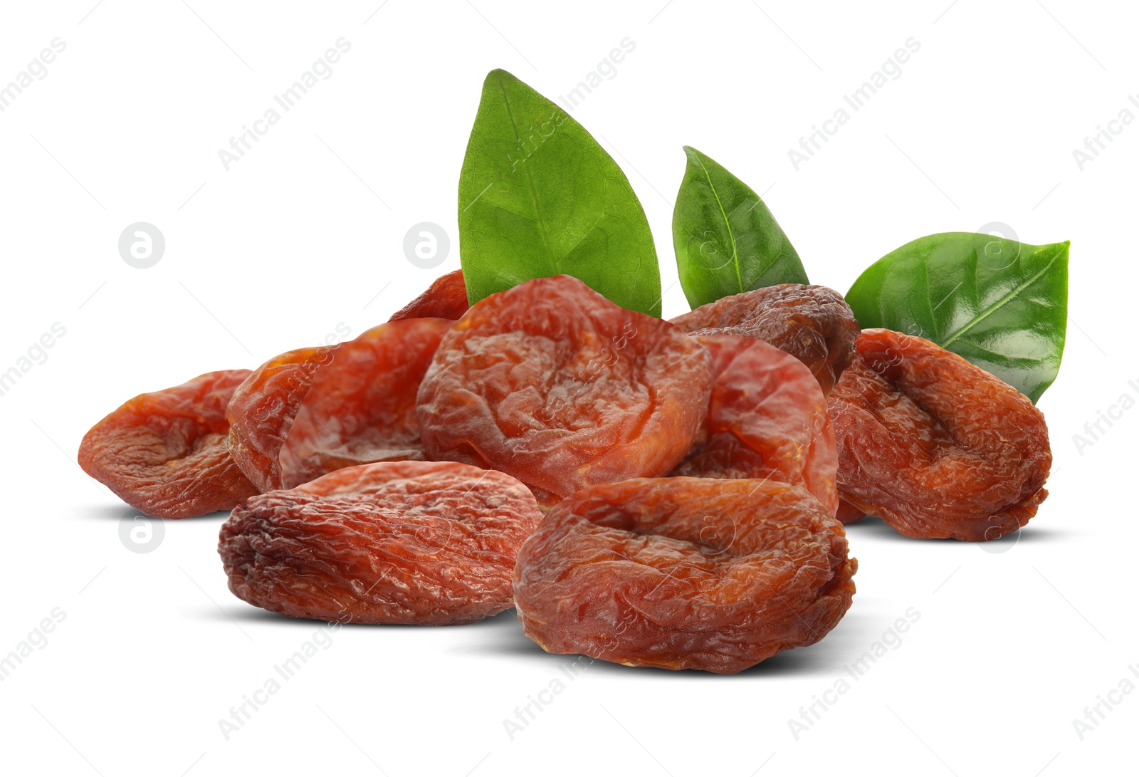 Image of Tasty dried apricots and green leaves on white background