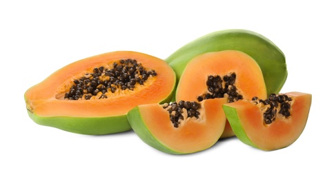 Fresh ripe papaya fruits on white background