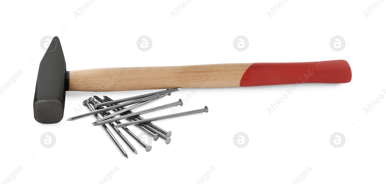 Photo of Hammer and metal nails on white background