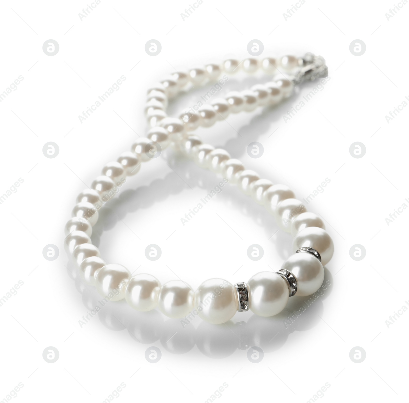 Photo of Elegant pearl necklace isolated on white. Luxury jewelry