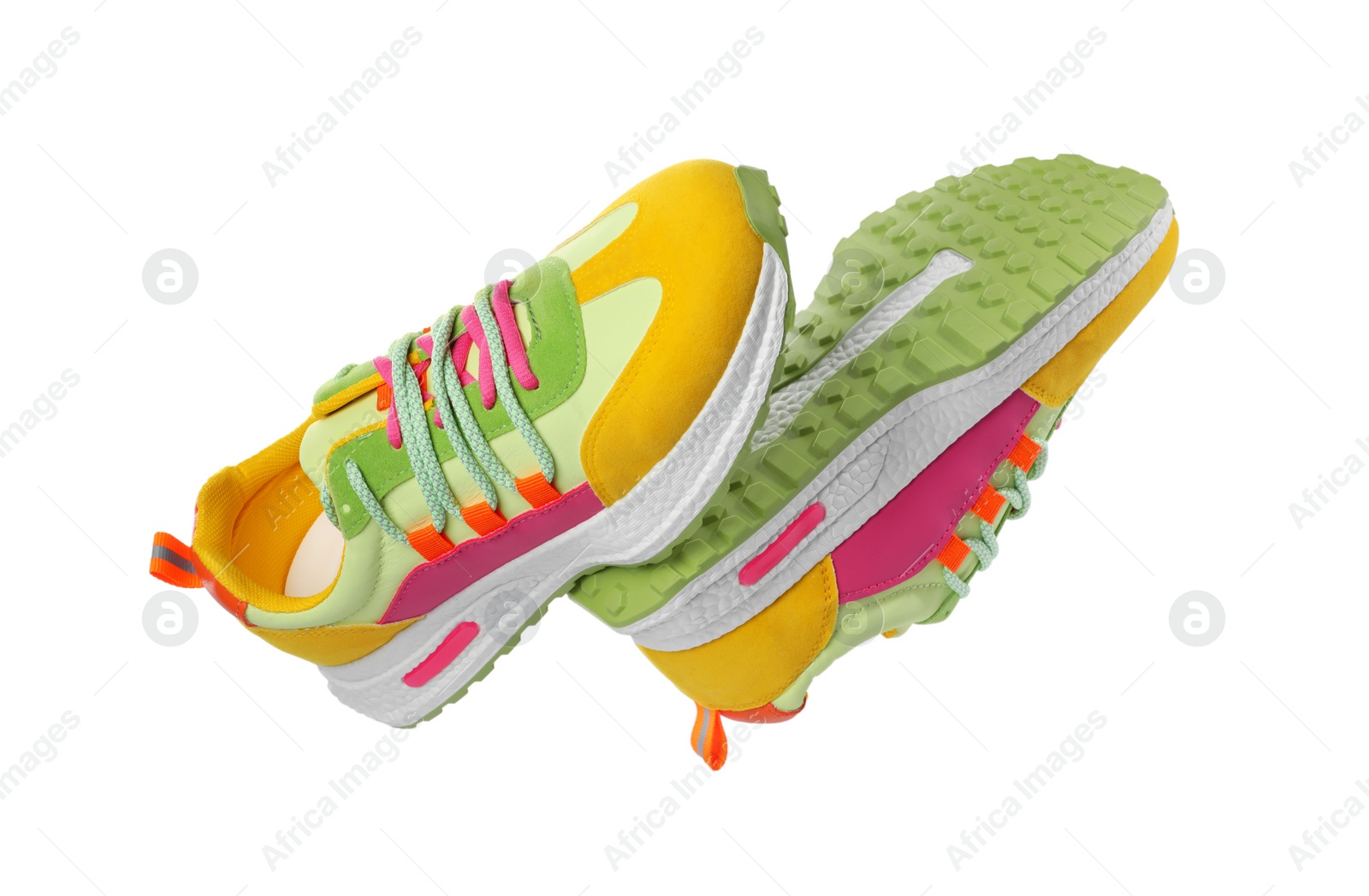 Photo of Pair of stylish colorful sneakers on white background